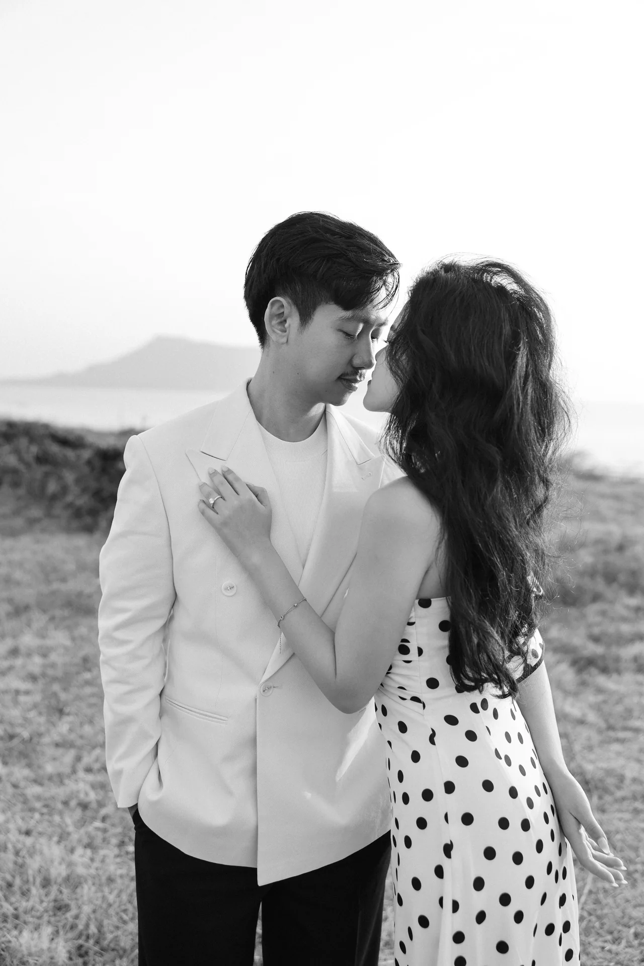 Intimate moment in polka dot dress