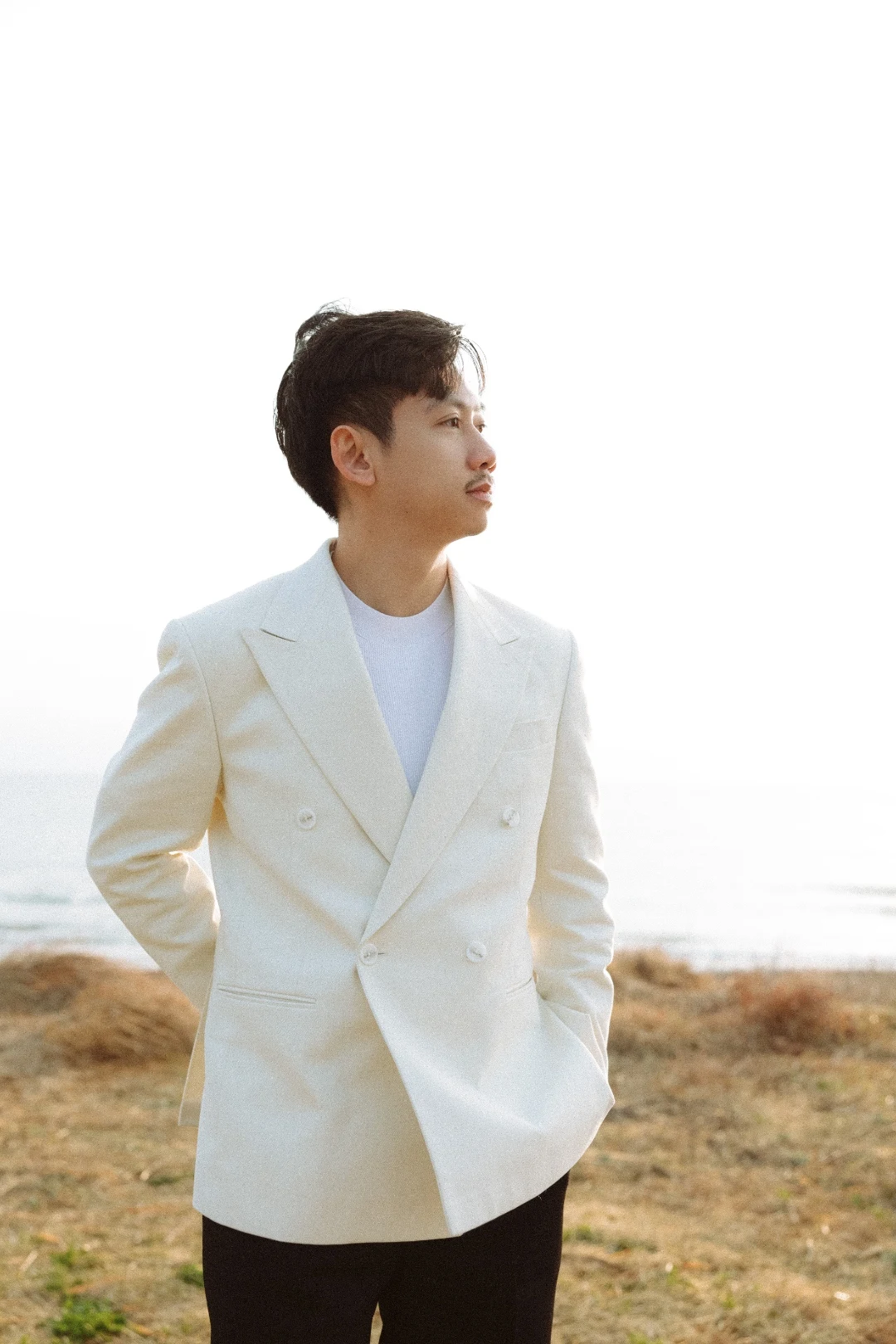 Vũ gazing at the Jeju sunset