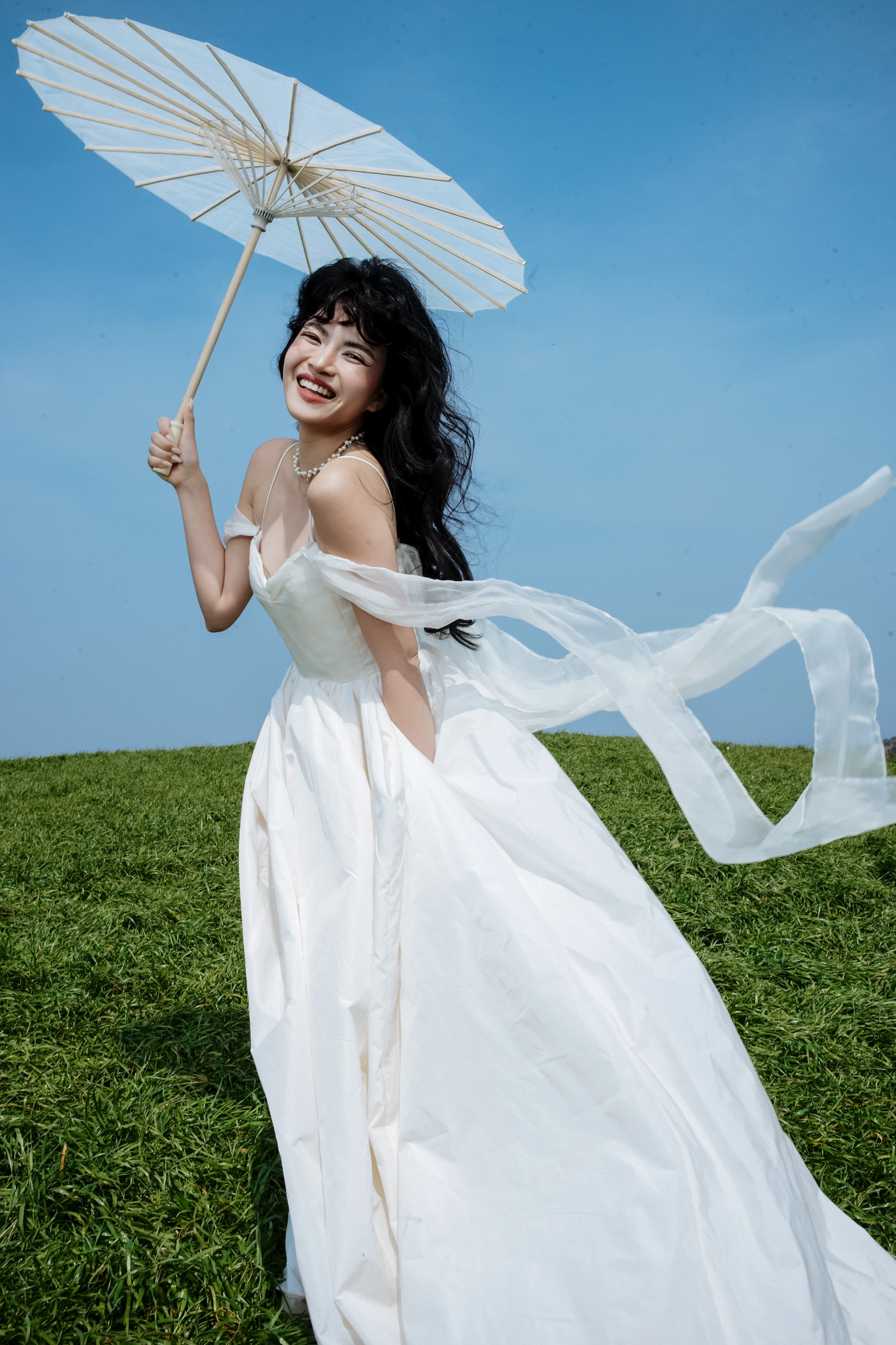 Thi laughing on the Jeju hillside