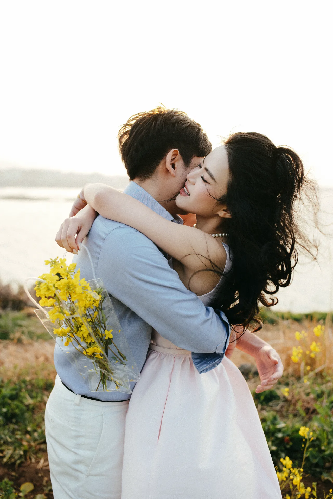 Embrace in the flower field