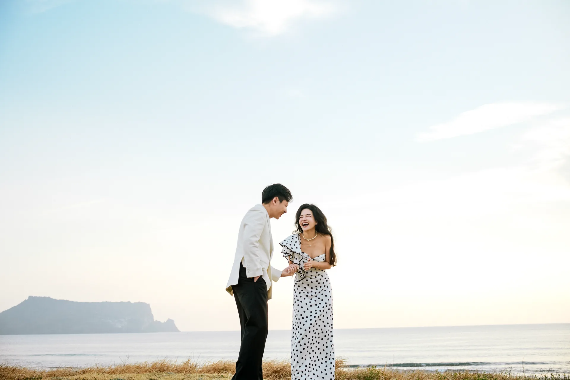 Laughing on coastal cliff