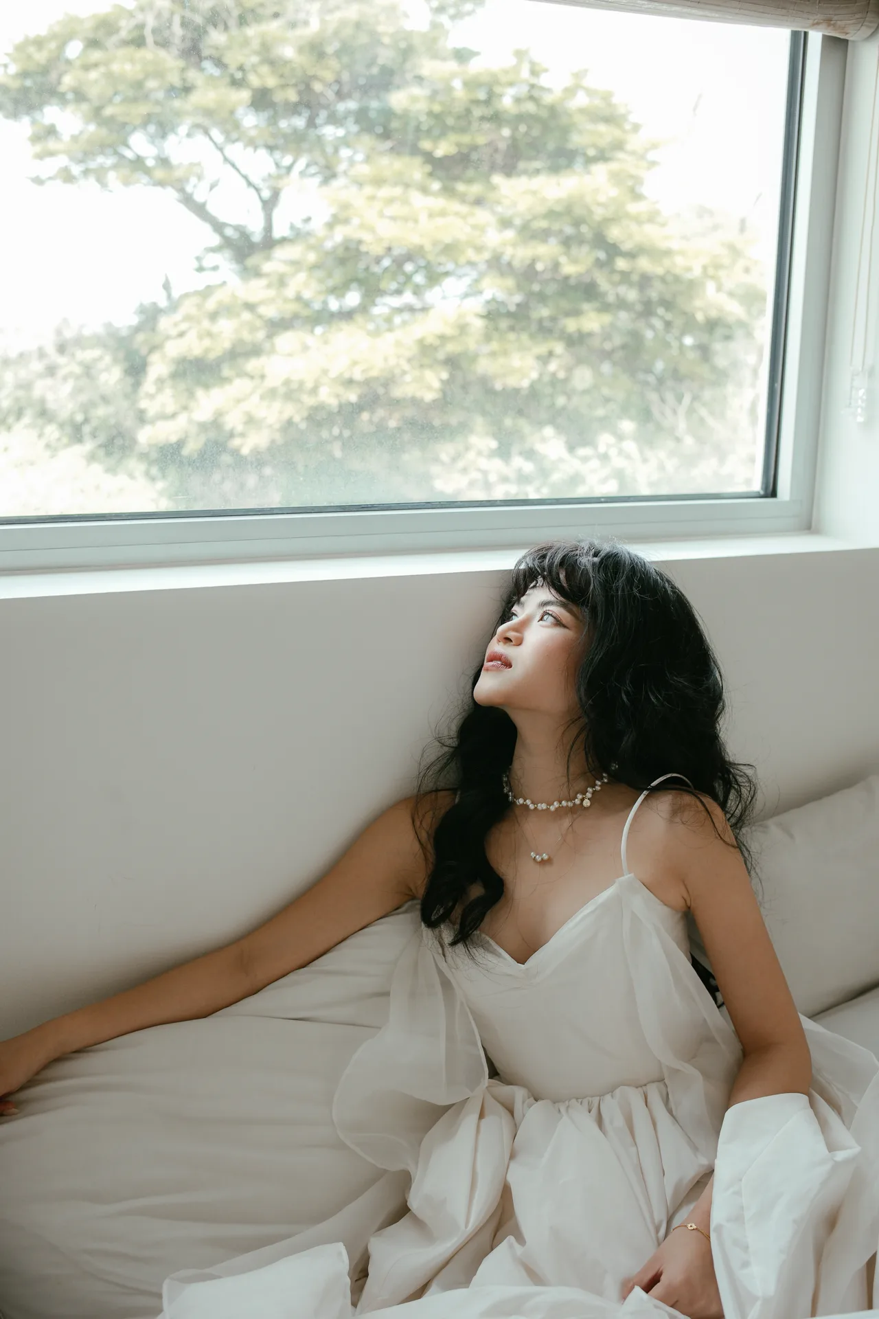 Reclining, gazing upward